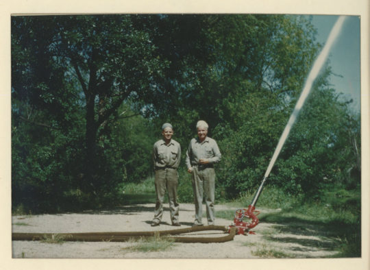 O.C. Martine with firefighter colleague